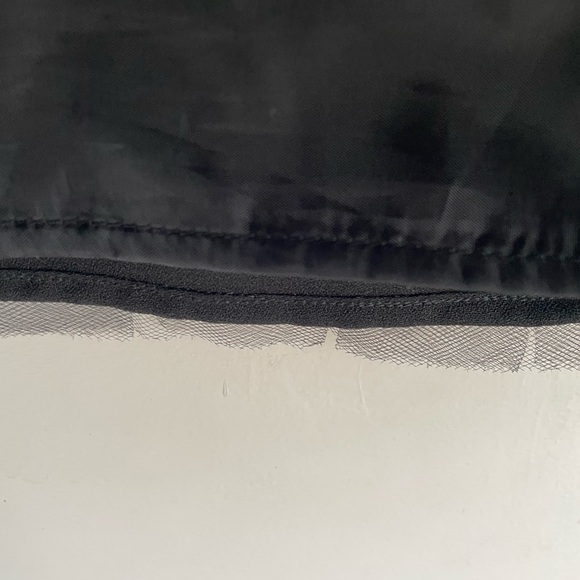 A line black skirt with subtle mesh lace at hem - Picture 3 of 4